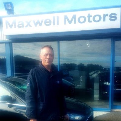 PORTEOUS ARRIVES AT MAXWELL MOTORS...